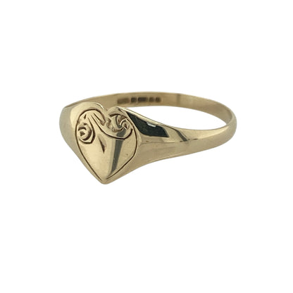 Add a touch of romance and timeless charm to your jewellery collection with this pre-owned 9ct yellow gold patterned heart signet ring, featuring a classic heart-shaped design with elegant everyday appeal—perfect for gifting, sentimental wear, or as a delicate statement piece.

Design: The ring showcases a charming heart-shaped signet face measuring approximately 8mm high, enhanced with attractive patterned detailing that adds texture and character.