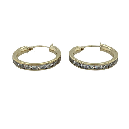 Add timeless sparkle and elegant style to your jewellery collection with these pre-owned 9ct yellow gold cubic zirconia hoop creole earrings, featuring a classic design with glamorous everyday appeal—perfect for special occasions, gifting, or effortless daily wear.

Design: The earrings feature a stylish hoop creole design accented with sparkling cubic zirconia stones, creating a beautiful display of light and brilliance.