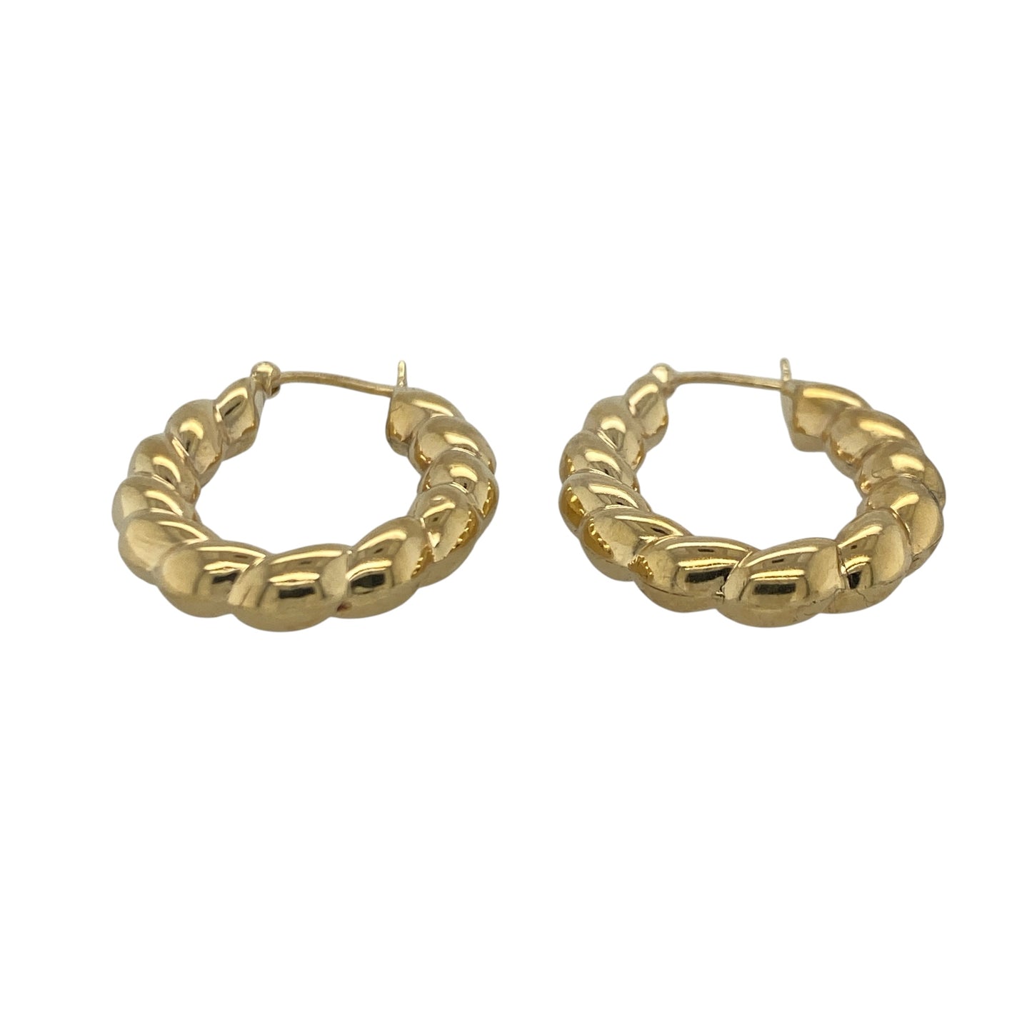 Add timeless elegance and stylish texture to your jewellery collection with these pre-owned 9ct yellow gold twisted oval creole earrings, featuring a classic design with versatile everyday appeal—perfect for gifting, daily wear, or effortless styling.

Design: The earrings feature an elegant oval creole shape enhanced by a twisted design that catches the light beautifully from every angle