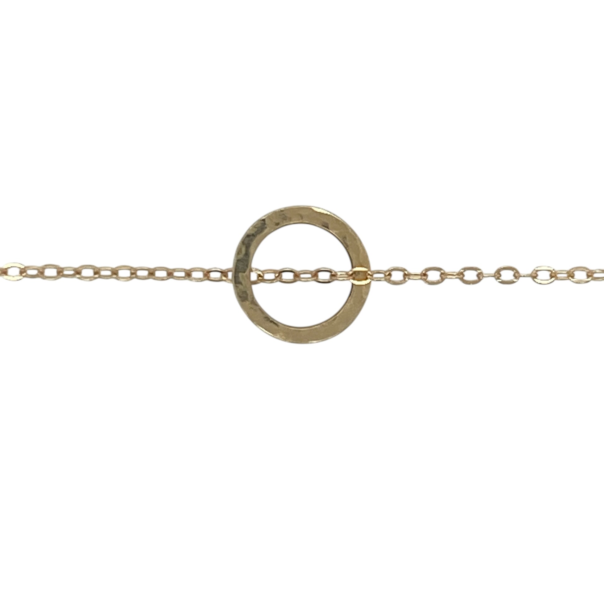 Add timeless simplicity and contemporary elegance to your jewellery collection with this pre-owned 14ct yellow gold circle pendant necklace, featuring a minimalist design with versatile everyday appeal—perfect for gifting, layering, or effortless daily wear.

Design: The necklace features a polished circular pendant measuring approximately 9mm in diameter, creating a clean and elegant focal point. Suspended from a delicate 16-inch trace chain, the simple geometric design offers a timeless and modern look.