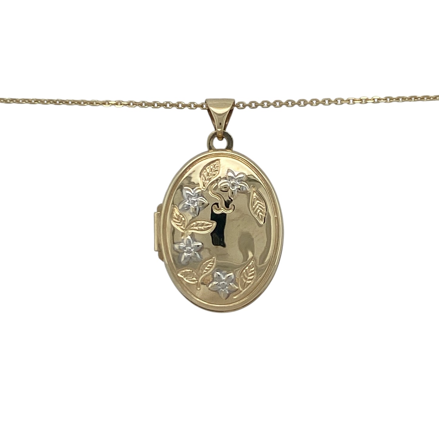 Add timeless elegance and sentimental charm to your jewellery collection with this pre-owned 9ct yellow and white gold flower patterned oval locket necklace, featuring a beautifully detailed design with classic everyday appeal—perfect for gifting, special occasions, or treasured personal wear.

Design: The necklace features an elegant oval locket pendant measuring approximately 2.9cm in length including the bail.