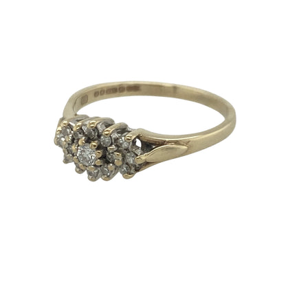 Add timeless sparkle and delicate elegance to your jewellery collection with this pre-owned 9ct yellow gold diamond small cluster ring, featuring a classic design with refined everyday appeal—perfect for special occasions, gifting, or effortless daily wear.

Design: The ring showcases a charming diamond cluster measuring approximately 6mm wide at the front, creating a beautiful focal point with eye-catching brilliance. The compact cluster design offers classic styling in a refined and wearable size.