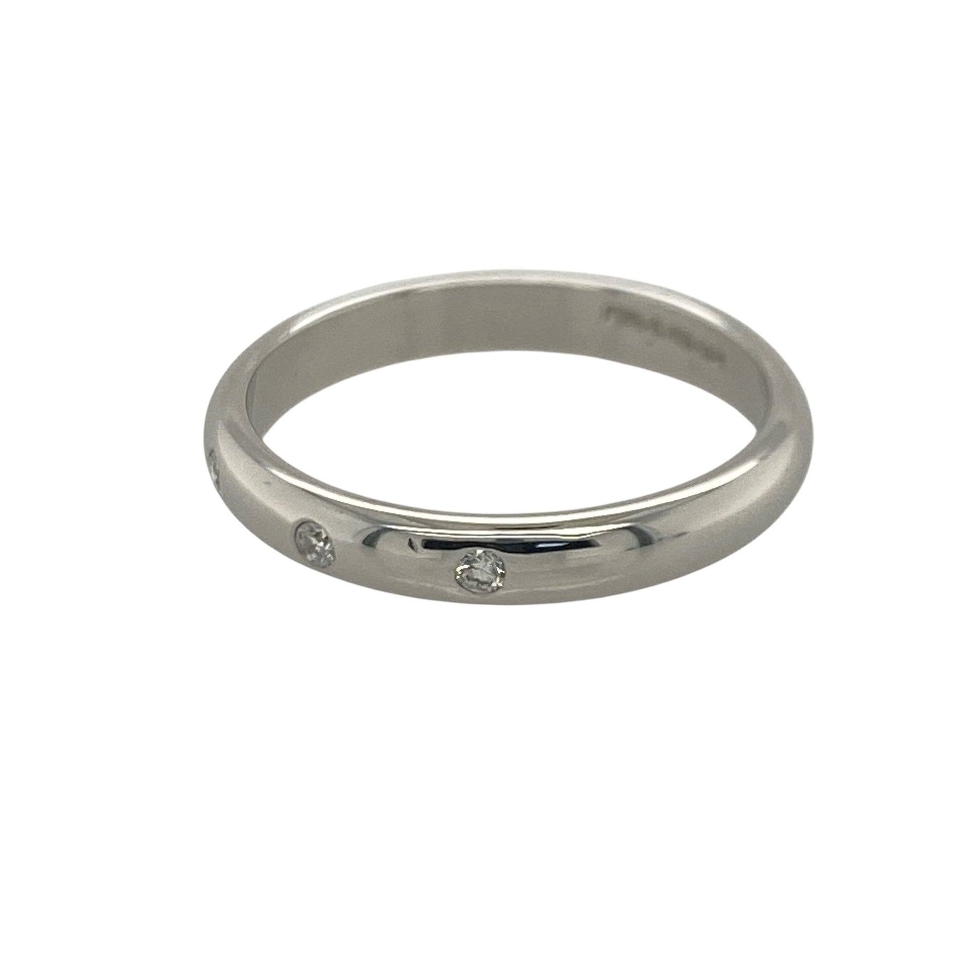 Add timeless sparkle and elegant simplicity to your jewellery collection with this pre-owned 9ct white gold diamond band ring, featuring a classic three-stone design with refined everyday appeal—perfect for anniversaries, special occasions, or sophisticated daily wear.

Design: The ring features a sleek 3mm wide band set with three sparkling diamonds, creating a beautifully balanced display of brilliance and timeless style. The clean lines and classic proportions make it a versatile and elegant piece.