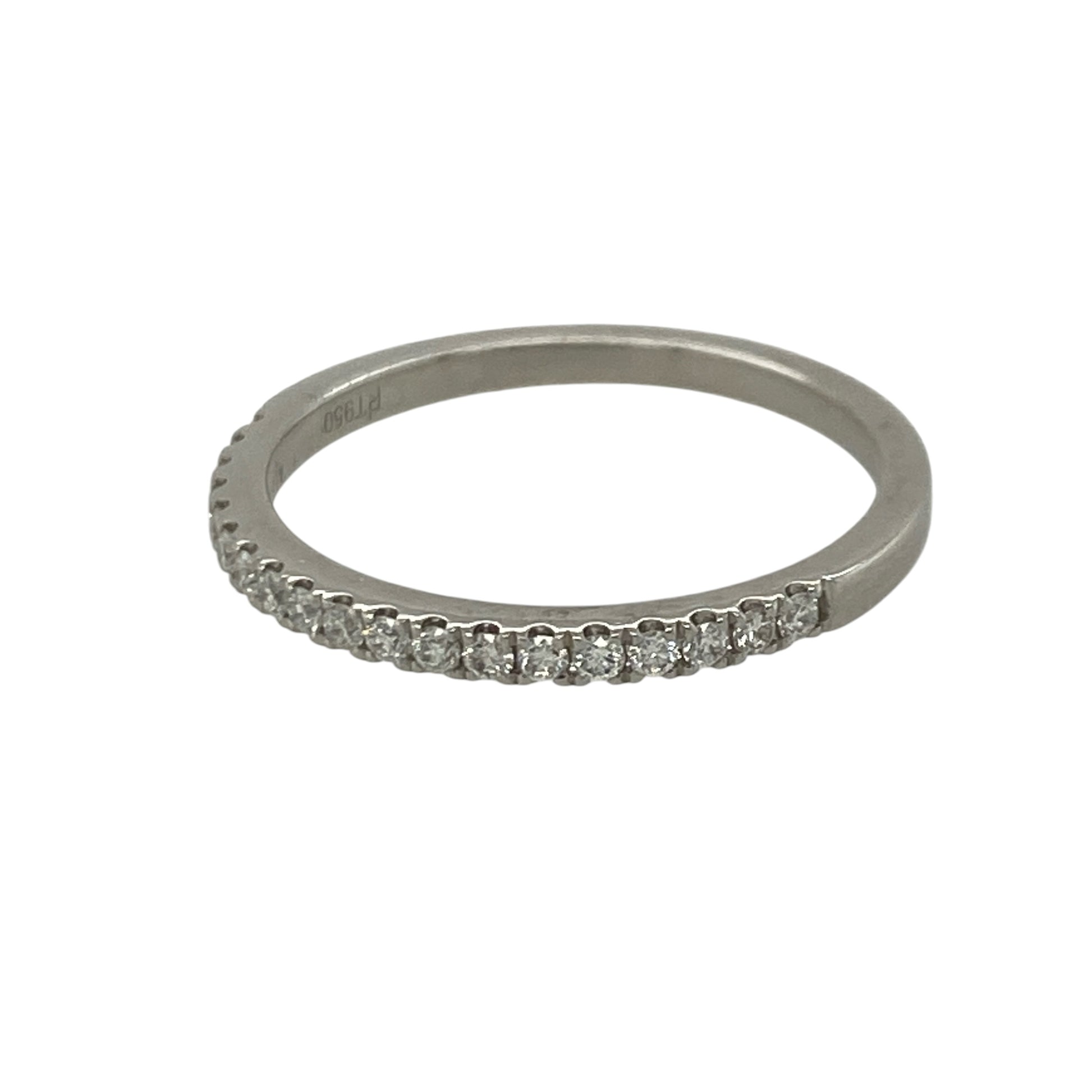 Add timeless sparkle and understated elegance to your jewellery collection with this pre-owned platinum diamond grain set band ring, featuring a classic design with refined everyday appeal—perfect for weddings, anniversaries, stacking, or sophisticated daily wear.

Design: The ring features a sleek band design measuring approximately 2mm wide at the front, with sparkling diamonds grain set along the band to create a delicate yet eye-catching display of brilliance.