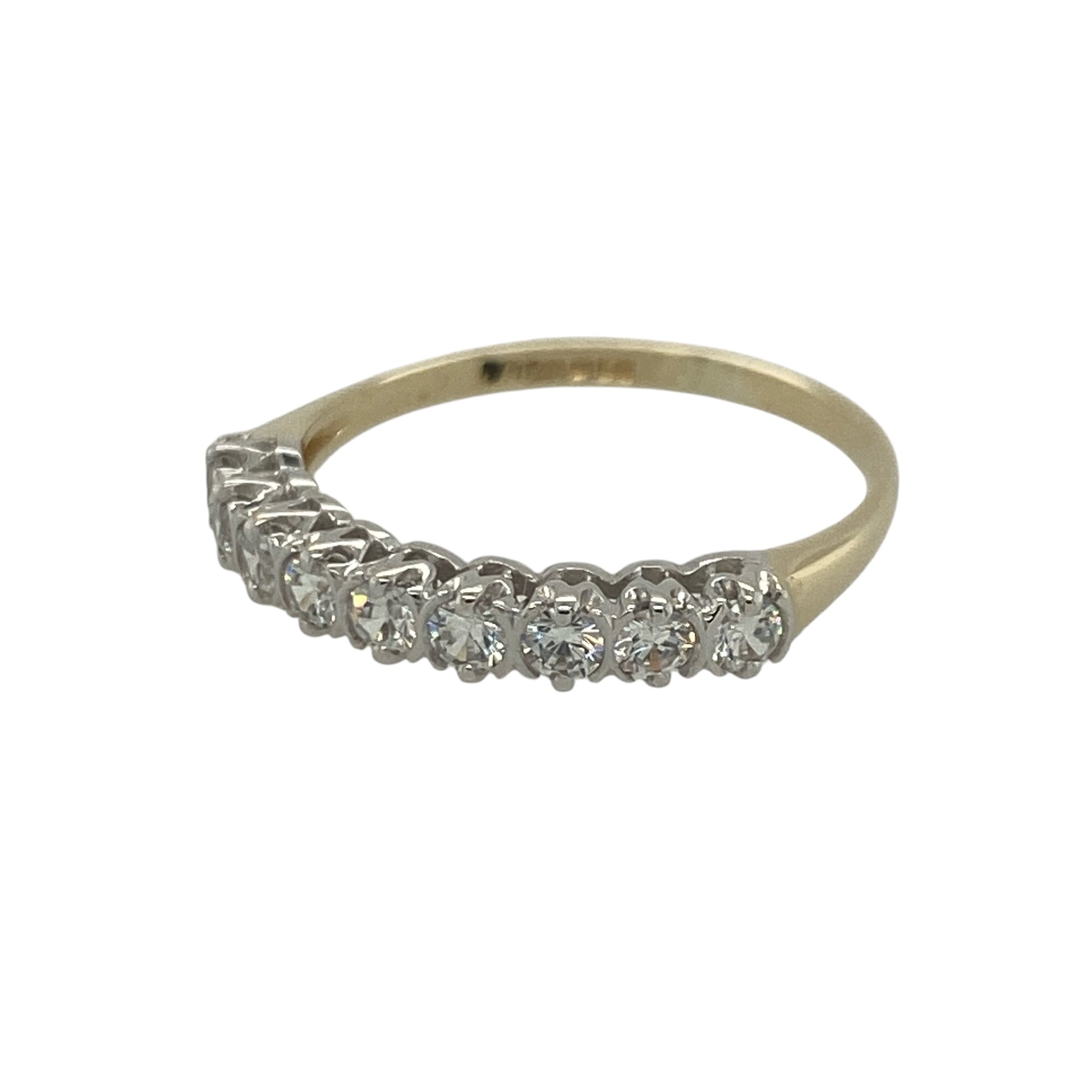 Add timeless sparkle and elegant simplicity to your jewellery collection with this pre-owned 9ct yellow gold cubic zirconia band ring, featuring a classic design with versatile everyday appeal—perfect for special occasions, gifting, stacking, or daily wear.

Design: The ring features a row of sparkling cubic zirconia stones, each measuring approximately 3mm in diameter, creating a beautiful display of brilliance across the band.