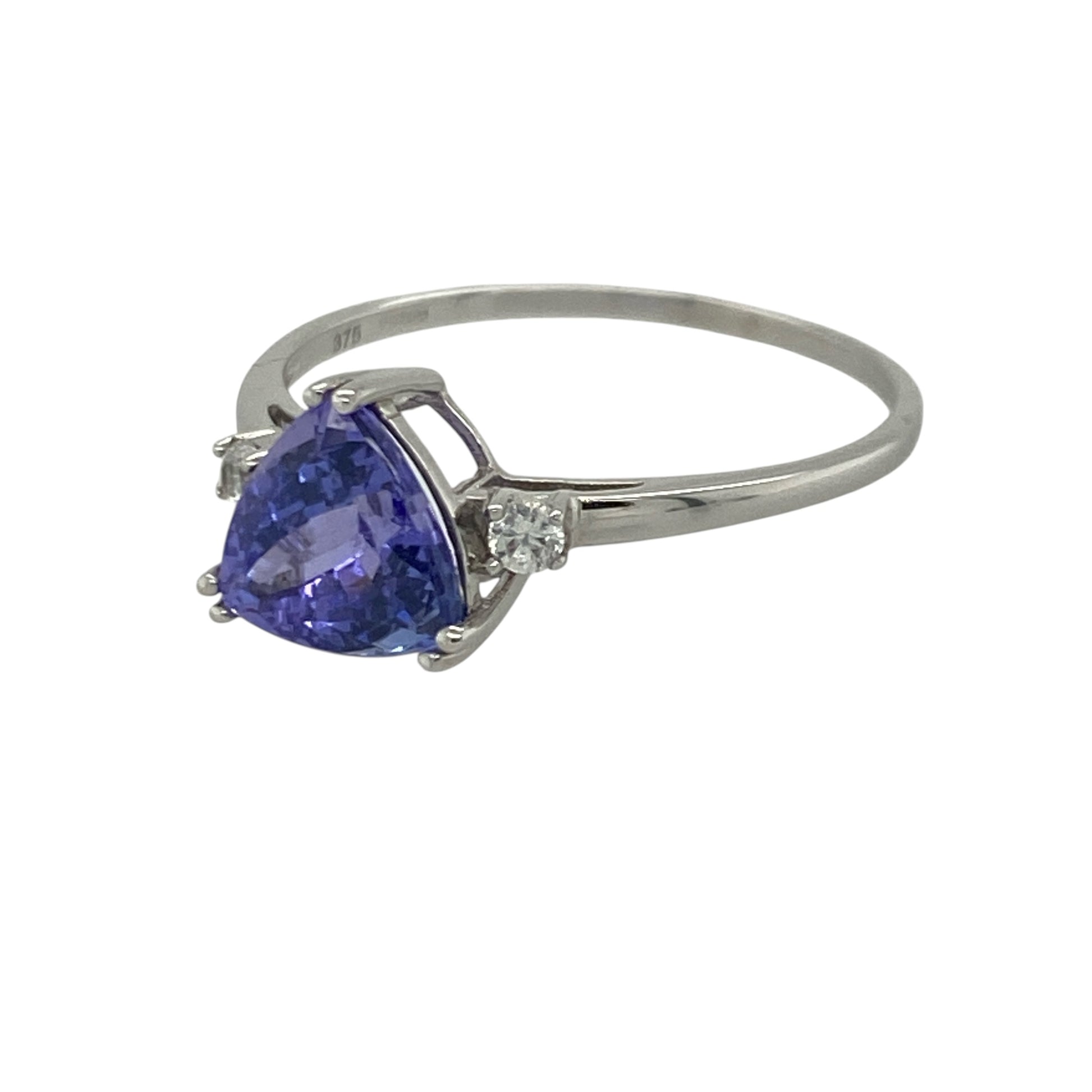 Add captivating colour and elegant sparkle to your jewellery collection with this pre-owned 9ct white gold tanzanite and cubic zirconia ring, featuring a distinctive gemstone design with sophisticated everyday appeal—perfect for special occasions, gifting, or refined daily wear.

Design: The ring showcases a beautiful triangle-cut tanzanite measuring approximately 7mm by 7mm by 7mm, creating a striking focal point with its vibrant violet-blue tones. 