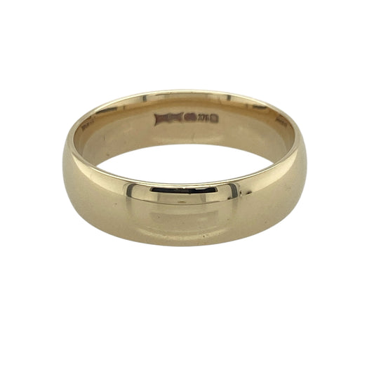 Celebrate timeless commitment with this pre-owned 9ct yellow gold wedding band ring, featuring a classic and elegant design with enduring everyday appeal—perfect as a wedding ring, anniversary band, or a versatile addition to any jewellery collection.

Design: The ring features a traditional polished wedding band profile measuring approximately 6mm wide, offering a bold and timeless appearance.