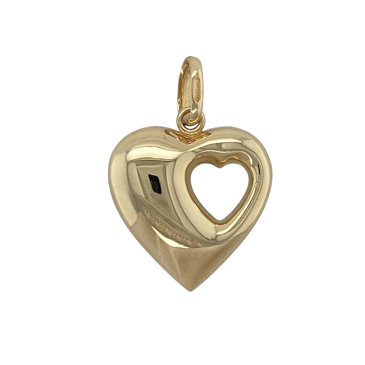 Add a touch of romance and timeless elegance to your jewellery collection with this pre-owned 9ct yellow gold heart pendant, featuring a beautiful layered design with meaningful everyday appeal—perfect for gifting, anniversaries, or sentimental wear.

Design: The pendant features a classic heart shape with a smaller cut-out heart incorporated within the design, creating an attractive layered effect that adds depth and visual interest. The elegant styling offers a timeless symbol of love and affection.