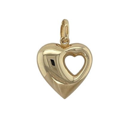 Add a touch of romance and timeless elegance to your jewellery collection with this pre-owned 9ct yellow gold heart pendant, featuring a beautiful layered design with meaningful everyday appeal—perfect for gifting, anniversaries, or sentimental wear.

Design: The pendant features a classic heart shape with a smaller cut-out heart incorporated within the design, creating an attractive layered effect that adds depth and visual interest. The elegant styling offers a timeless symbol of love and affection.
