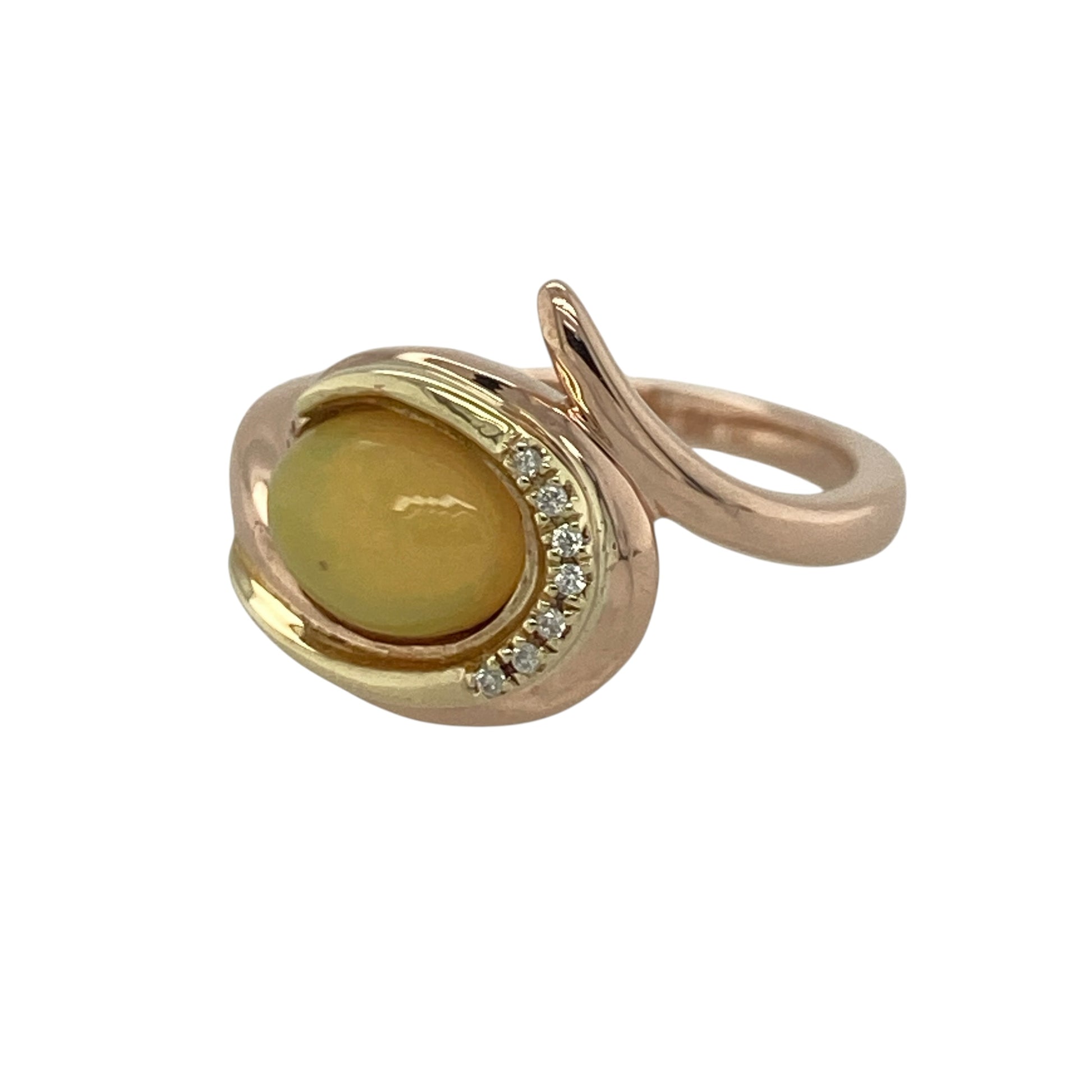 Add a touch of Welsh-inspired elegance and vibrant colour to your jewellery collection with this pre-owned 9ct rose and yellow gold diamond and yellow Opalique Clogau ring, featuring a beautiful gemstone design with timeless sophistication—perfect for special occasions, gifting, or refined everyday wear.

Design: The ring showcases a stunning oval yellow Opalique stone measuring approximately 8mm by 6mm, creating an eye-catching focal point with its warm golden tones and captivating iridescence.