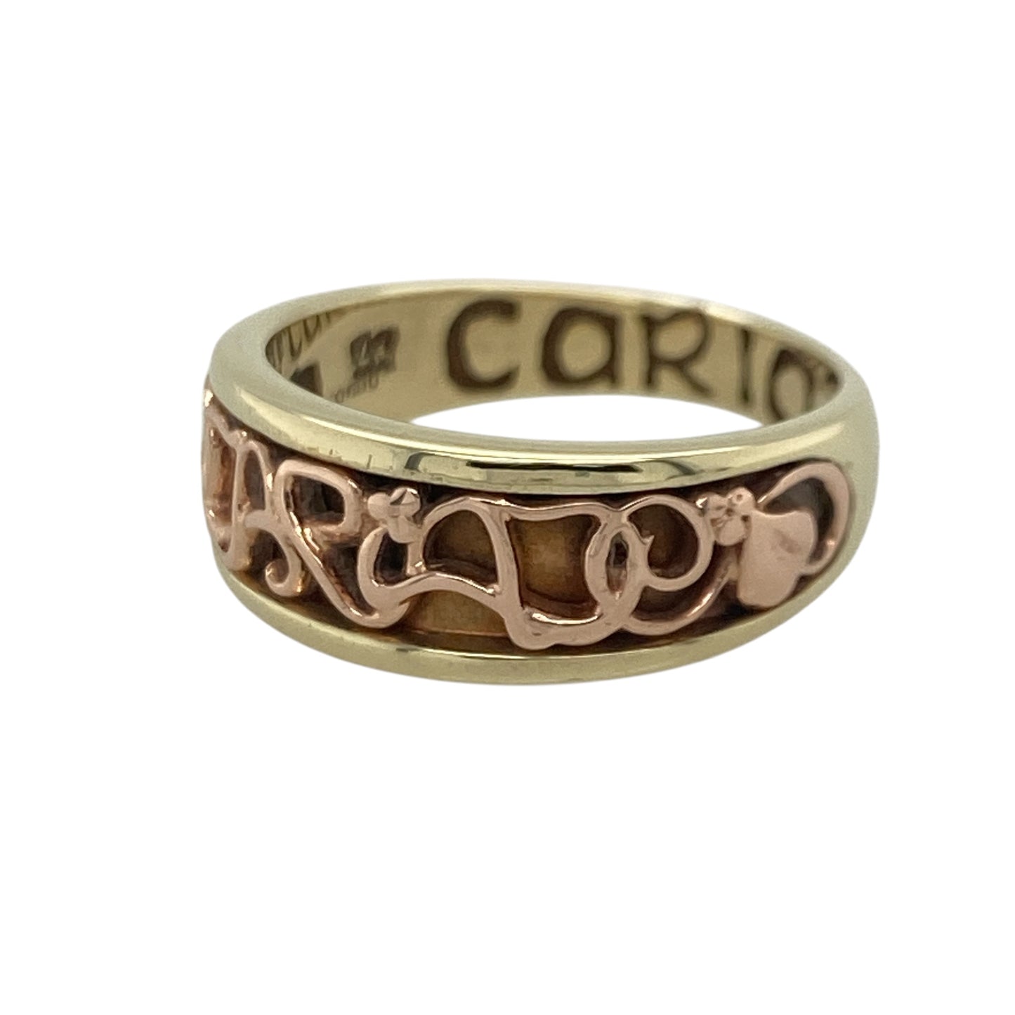 Add a touch of Welsh heritage and timeless romance to your jewellery collection with this pre-owned 9ct yellow and rose gold Clogau Cariad band ring, featuring an iconic design with elegant everyday appeal—perfect for gifting, anniversaries, or meaningful daily wear.

Design: The ring features the distinctive Cariad design across a substantial 7mm wide band, creating a striking and instantly recognisable look. 