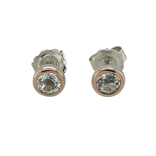 Add timeless sparkle and Welsh-inspired elegance to your jewellery collection with these pre-owned sterling silver and white topaz Clogau stud earrings, featuring a classic design with refined everyday appeal—perfect for gifting, special occasions, or effortless daily wear.

Design: The earrings showcase sparkling round white topaz gemstones, each measuring approximately 5mm in diameter.