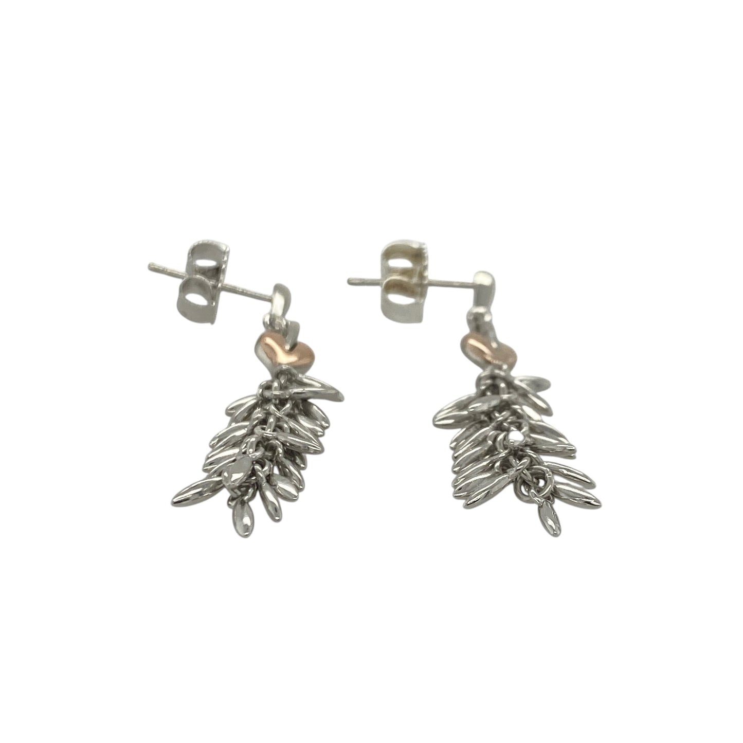 Add a touch of Welsh heritage and symbolic elegance to your jewellery collection with these pre-owned sterling silver and 9ct rose gold Clogau Tree of Life dangle drop earrings, featuring a beautifully detailed design with timeless appeal—perfect for gifting, special occasions, or refined everyday wear.

Design: The earrings showcase the iconic Tree of Life motif in an elegant dangle drop design, creating graceful movement and an eye-catching appearance when worn.