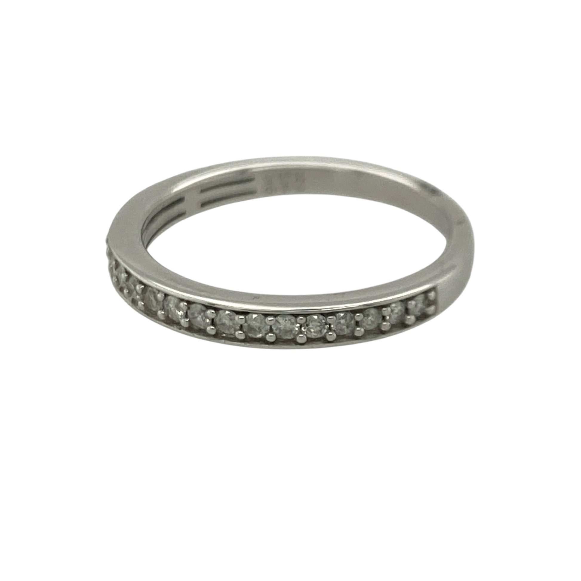 Add timeless sparkle and elegant sophistication to your jewellery collection with this pre-owned 9ct white gold diamond band ring, featuring a classic design with versatile everyday appeal—perfect for anniversaries, special occasions, stacking, or refined daily wear.

Design: The ring features a sleek diamond-set band measuring approximately 4mm wide at the front, creating a beautiful display of brilliance across the finger.