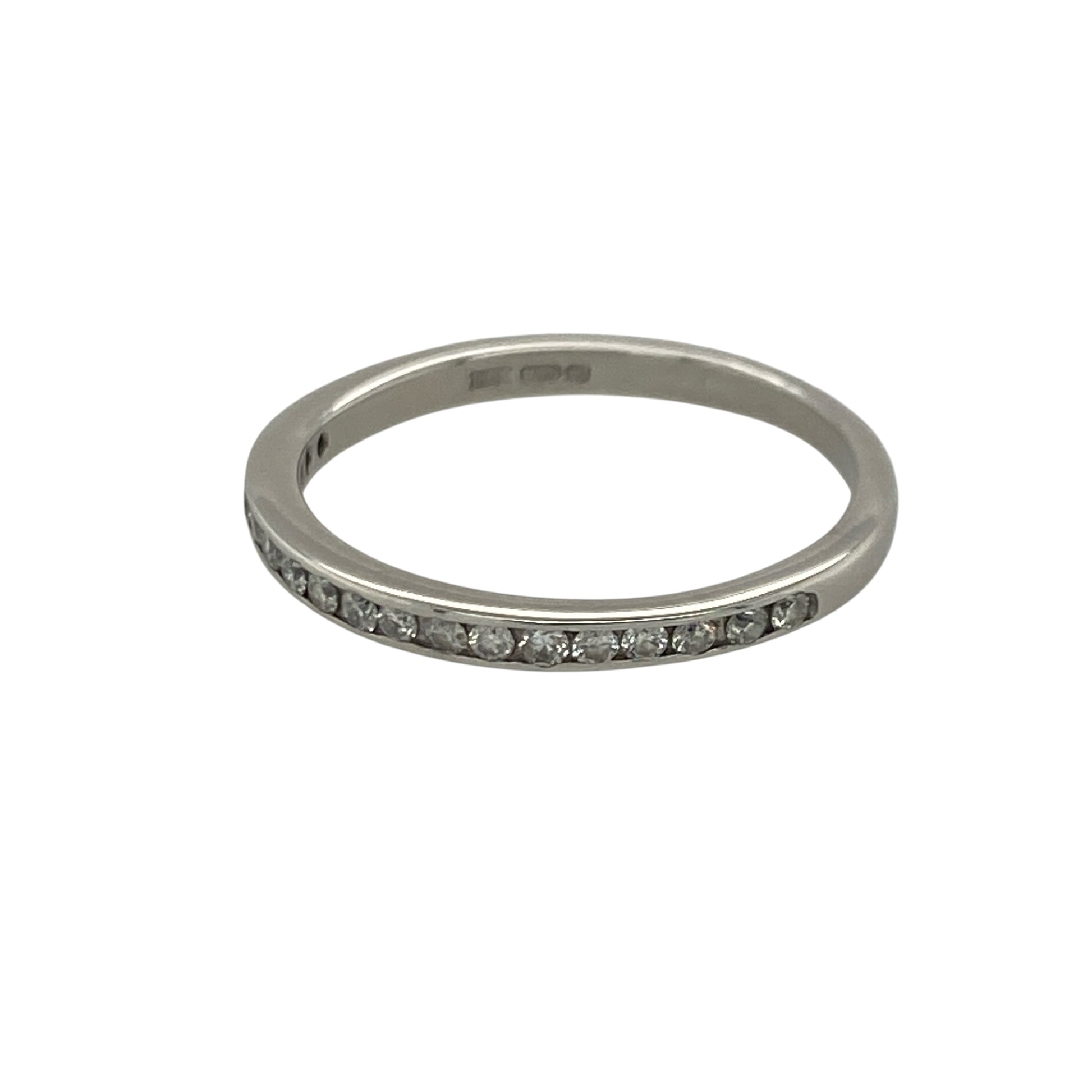 Add timeless sparkle and refined elegance to your jewellery collection with this pre-owned 18ct white gold diamond band ring, featuring a delicate design with sophisticated everyday appeal—perfect for anniversaries, stacking, weddings, or daily wear.

Design: The ring features a slim diamond-set band measuring approximately 2mm wide at the front, creating a graceful display of sparkle with a clean and elegant profile. Its delicate proportions make it a versatile and timeless choice.
