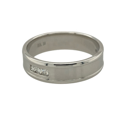 Add timeless sparkle and bold sophistication to your jewellery collection with this pre-owned 9ct white gold diamond channel set band ring, featuring a substantial design with elegant everyday appeal—perfect for anniversaries, special occasions, or luxurious daily wear.

Design: The ring features a striking channel-set diamond band measuring approximately 6mm wide, creating a bold and eye-catching display of brilliance across the finger.