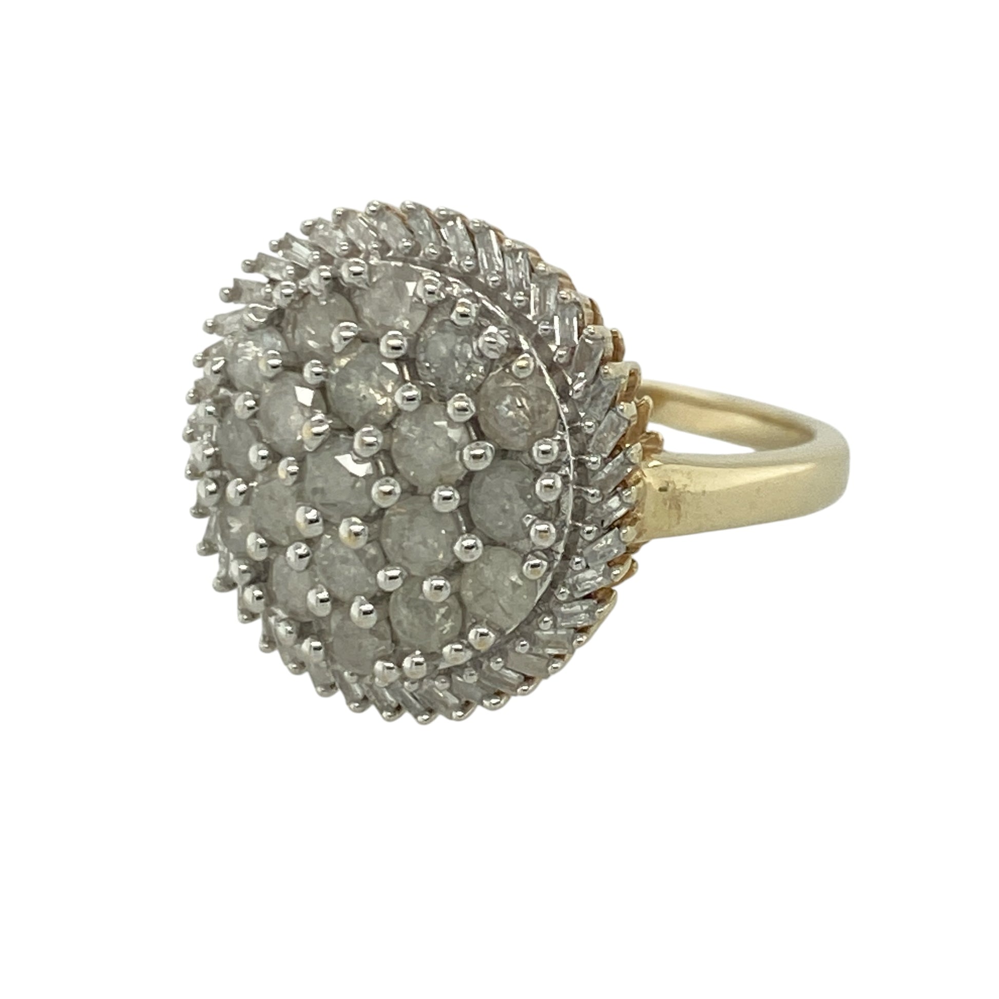 Add exceptional sparkle and bold elegance to your jewellery collection with this pre-owned 9ct yellow gold diamond cluster ring, featuring a striking statement design with luxurious everyday appeal—perfect for special occasions, gifting, or glamorous daily wear.

Design: The ring showcases an impressive round diamond cluster measuring approximately 17mm high at the front, creating a dazzling focal point with remarkable presence.