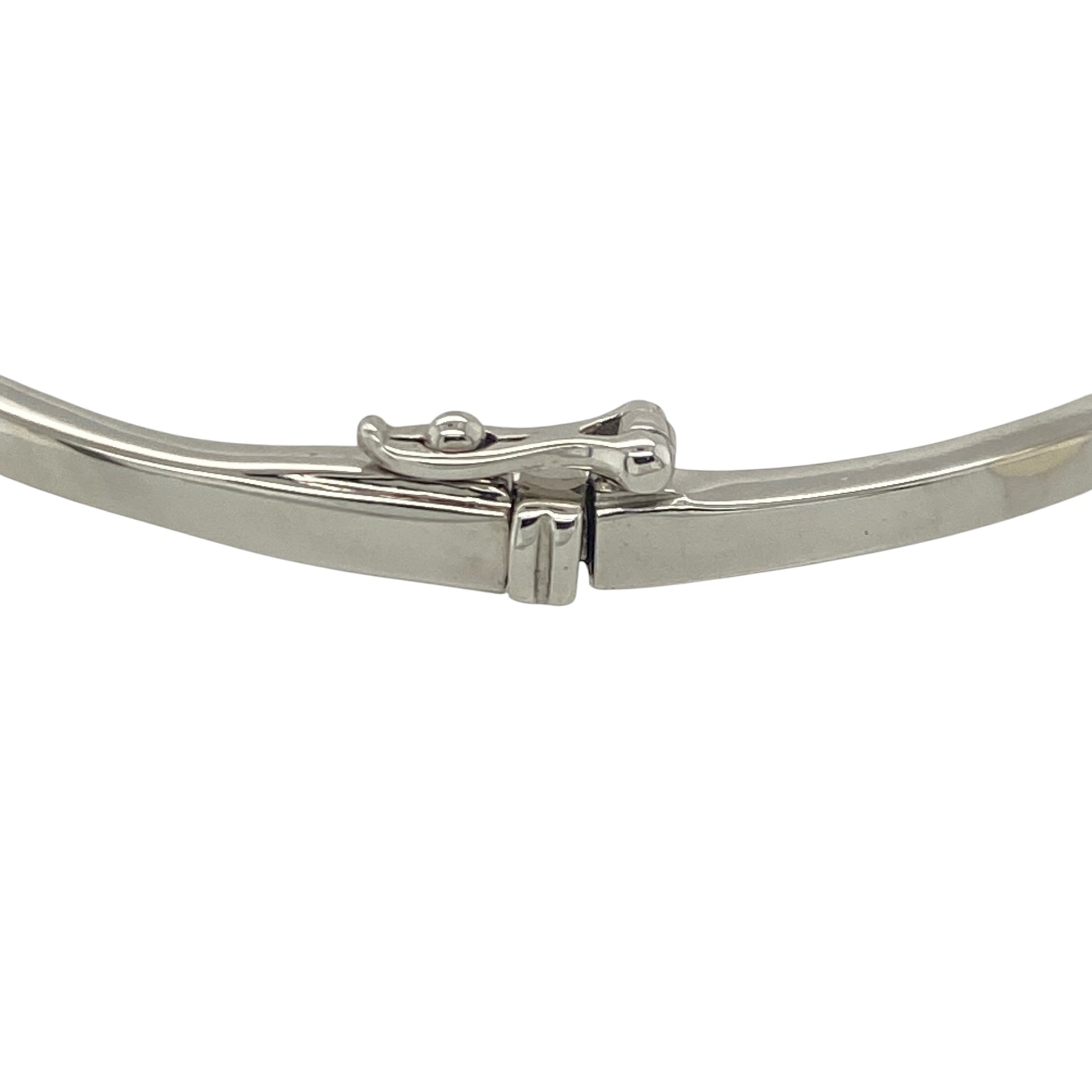 Add exceptional sparkle and contemporary elegance to your jewellery collection with this pre-owned 18ct white gold diamond square patterned bangle, featuring a striking geometric design with luxurious statement appeal—perfect for special occasions, gifting, or sophisticated everyday wear.

Design: The bangle showcases an eye-catching square patterned design across the front, creating a modern and distinctive look.