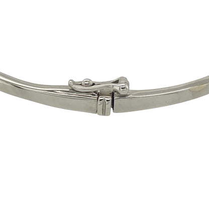 Add exceptional sparkle and contemporary elegance to your jewellery collection with this pre-owned 18ct white gold diamond square patterned bangle, featuring a striking geometric design with luxurious statement appeal—perfect for special occasions, gifting, or sophisticated everyday wear.

Design: The bangle showcases an eye-catching square patterned design across the front, creating a modern and distinctive look.