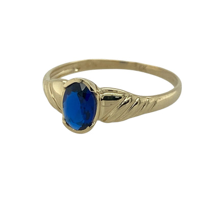 Add a touch of timeless colour and elegant simplicity to your jewellery collection with this pre-owned 14ct yellow gold blue stone solitaire ring, featuring a classic gemstone design with refined everyday appeal—perfect for gifting, special occasions, or sophisticated daily wear.

Design: The ring showcases a beautiful oval blue stone measuring approximately 7mm by 5mm, creating a striking focal point with vibrant colour and graceful proportions.