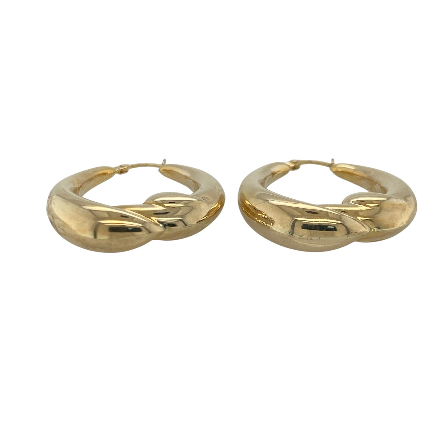 Add bold elegance and timeless style to your jewellery collection with these pre-owned 9ct yellow gold twist oval chunky creole earrings, featuring a striking design with versatile everyday appeal—perfect for special occasions, gifting, or making a statement with daily wear.

Design: The earrings feature a classic oval creole shape enhanced by an attractive twisted design, creating beautiful texture and light-catching detail.