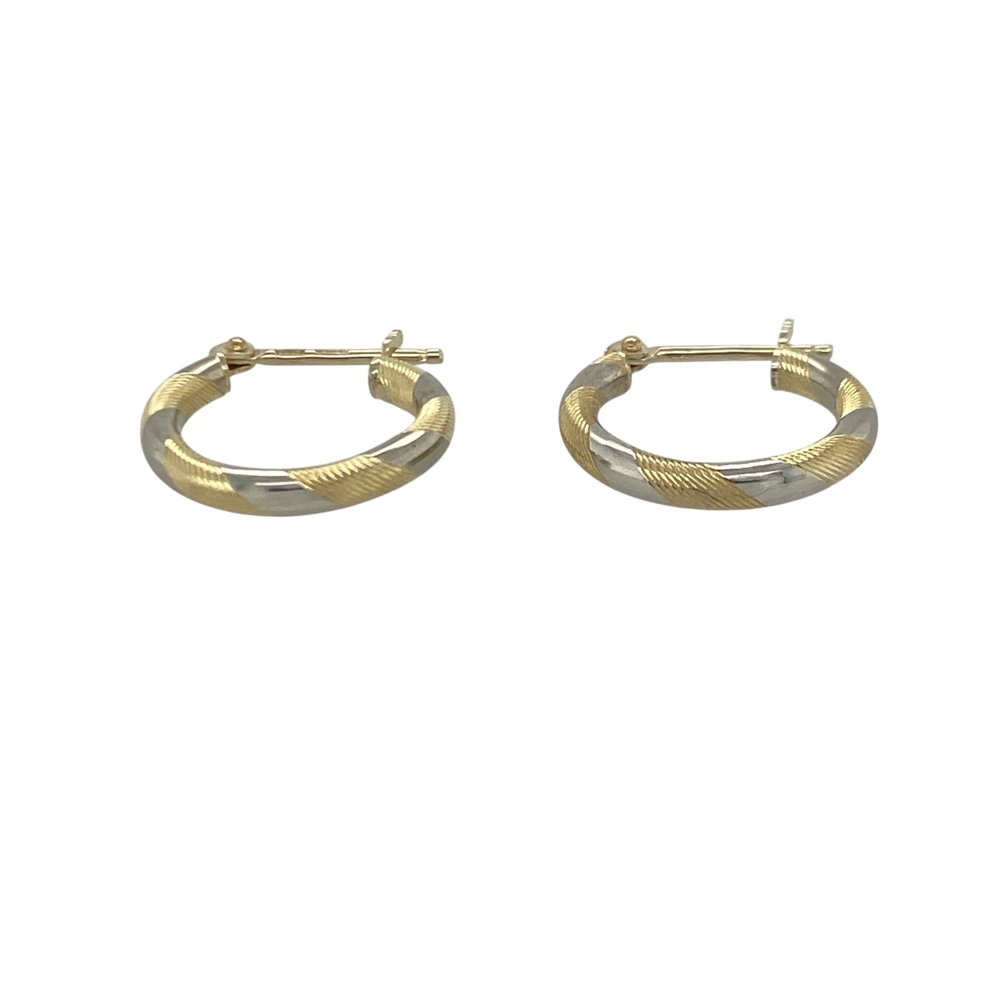 Add a touch of two-tone elegance to your jewellery collection with these pre-owned 9ct yellow and white gold striped hoop creole earrings, featuring a classic design with versatile everyday appeal—perfect for gifting, daily wear, or complementing any jewellery collection.

Design: The earrings feature a stylish small hoop creole design with attractive striped detailing, combining yellow and white gold tones to create a subtle yet eye-catching contrast.