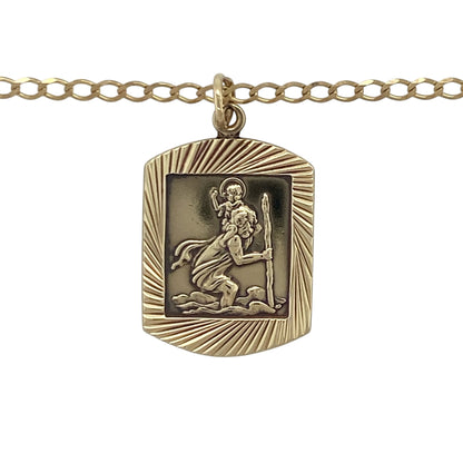Add meaningful symbolism and timeless style to your jewellery collection with this pre-owned 9ct yellow gold St Christopher pendant necklace, featuring a distinctive curved rectangular design with enduring everyday appeal—perfect for gifting, travellers, or personal wear.

Design: The necklace features a curved rectangular St Christopher pendant measuring approximately 2.9cm in length including the bail.