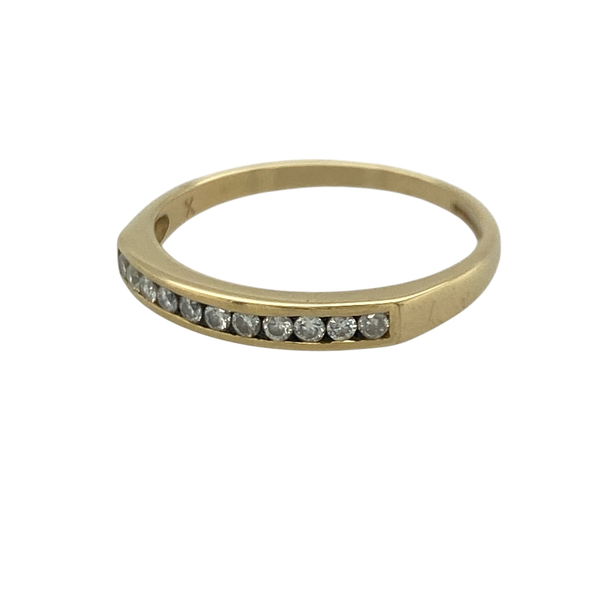 Add timeless sparkle and understated elegance to your jewellery collection with this pre-owned 18ct yellow gold diamond band ring, featuring a classic design with refined everyday appeal—perfect for anniversaries, weddings, stacking, or sophisticated daily wear.

Design: The ring features a sleek diamond-set band measuring approximately 2.5mm wide at the front, creating a delicate yet eye-catching display of brilliance.