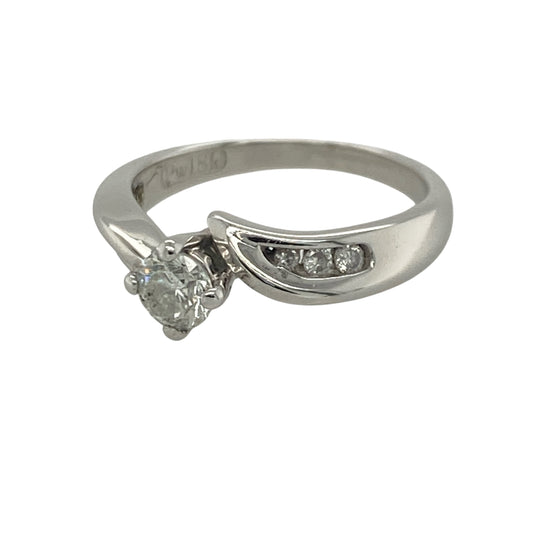 Add timeless elegance and graceful sparkle to your jewellery collection with this pre-owned 18ct white gold diamond twist solitaire ring, featuring a sophisticated design with luxurious everyday appeal—perfect for engagements, special occasions, or treasured daily wear.

Design: The ring showcases a sparkling centre diamond weighing approximately 0.25ct, beautifully presented in a classic solitaire setting.