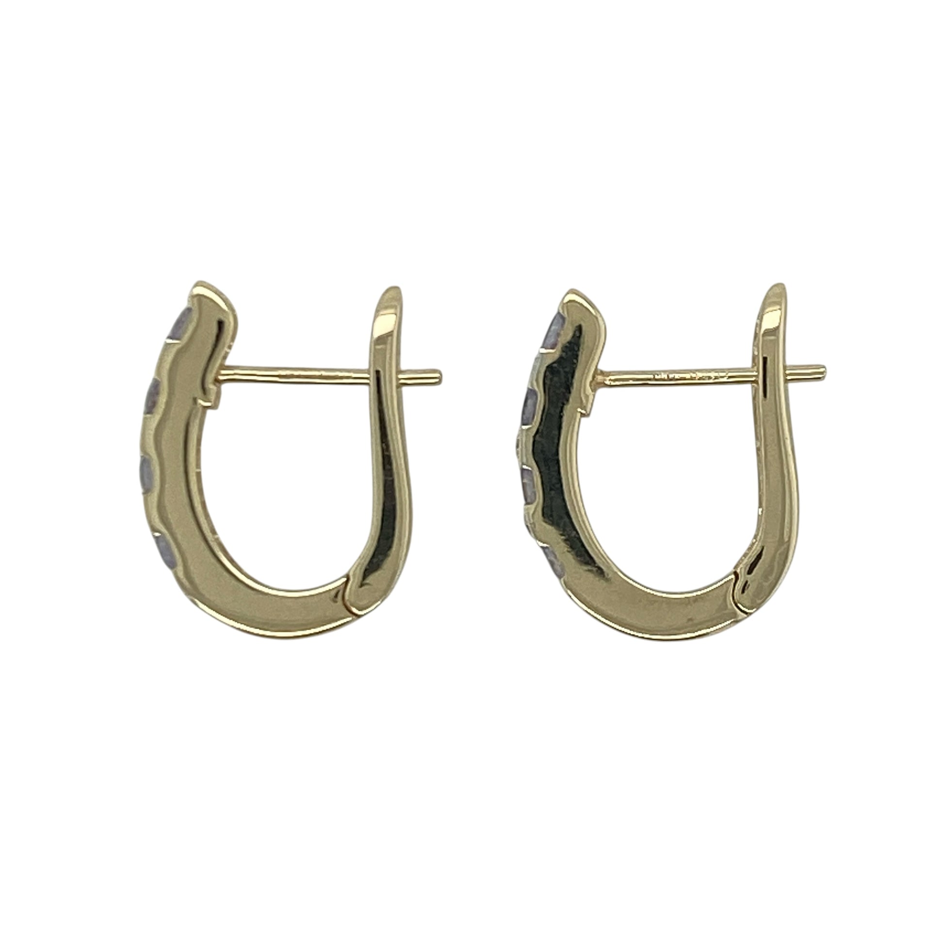 Add a touch of vibrant colour and elegant sparkle to your jewellery collection with these pre-owned 9ct yellow gold diamond and tanzanite hoop style earrings, featuring a sophisticated design with timeless everyday appeal—perfect for special occasions, gifting, or refined daily wear.

Design: The earrings feature an elegant oval hoop style design, beautifully accented with captivating tanzanite gemstones and sparkling diamond details.