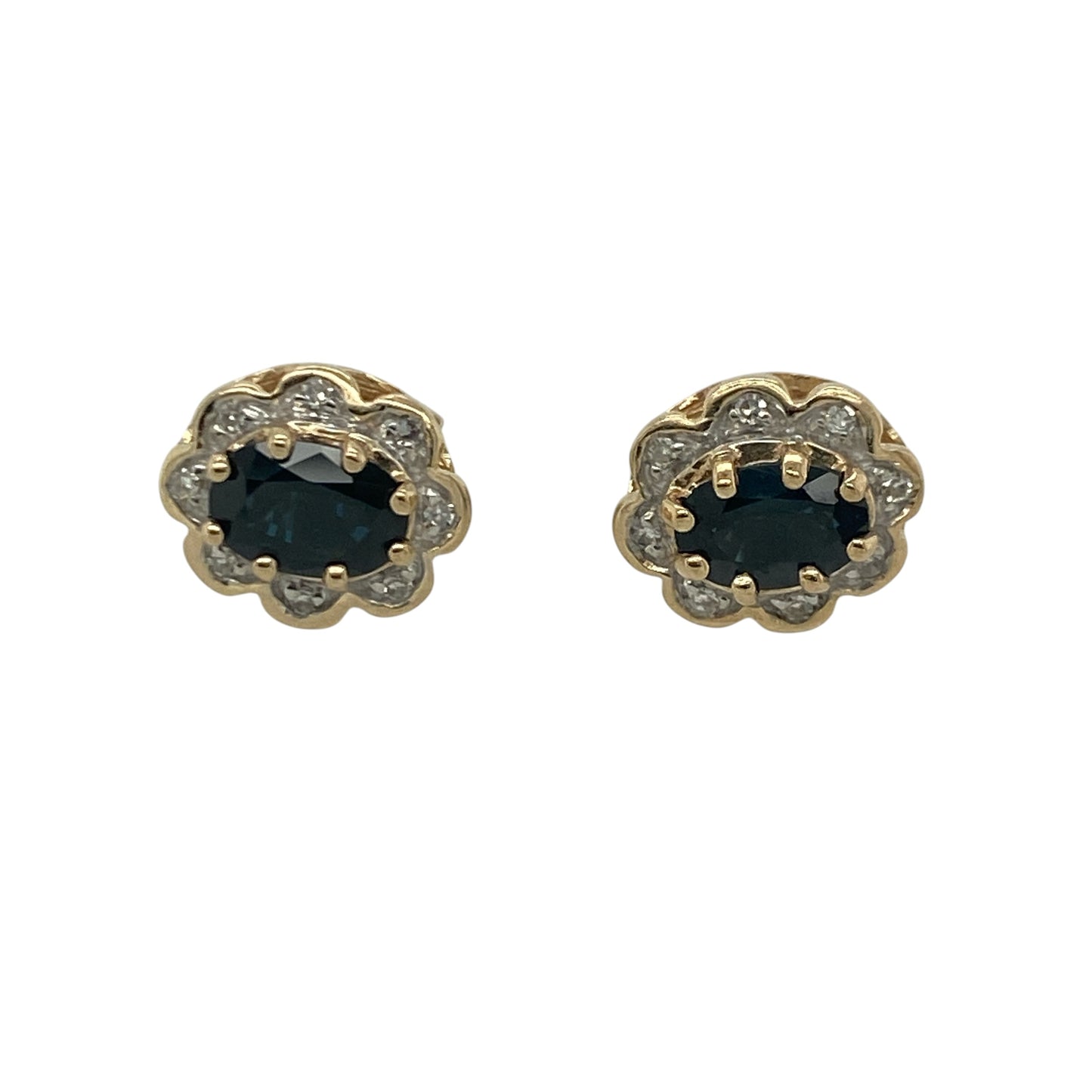 Add timeless elegance and vibrant colour to your jewellery collection with these pre-owned 9ct yellow gold diamond and sapphire cluster stud earrings, featuring a classic gemstone design with sophisticated everyday appeal—perfect for special occasions, gifting, or refined daily wear.

Design: The earrings showcase beautiful oval sapphire gemstones, each measuring approximately 6mm by 4mm, surrounded by sparkling diamond accents in an elegant cluster setting.