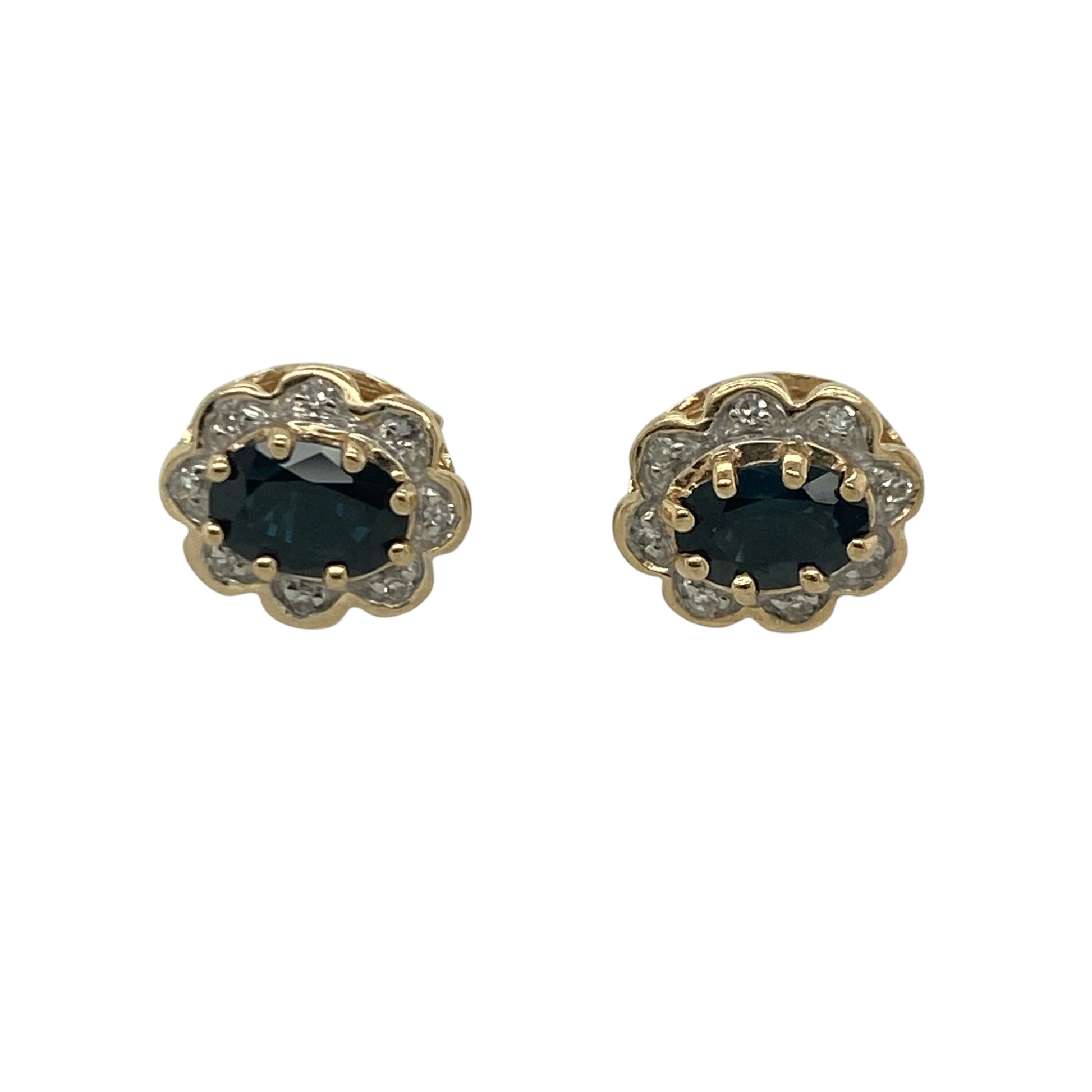 Add timeless elegance and vibrant colour to your jewellery collection with these pre-owned 9ct yellow gold diamond and sapphire cluster stud earrings, featuring a classic gemstone design with sophisticated everyday appeal—perfect for special occasions, gifting, or refined daily wear.

Design: The earrings showcase beautiful oval sapphire gemstones, each measuring approximately 6mm by 4mm, surrounded by sparkling diamond accents in an elegant cluster setting.