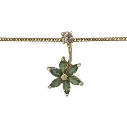 Add a touch of vibrant colour and elegant sparkle to your jewellery collection with this pre-owned 9ct yellow gold diamond and green stone pendant necklace, featuring a sophisticated design with timeless everyday appeal—perfect for special occasions, gifting, or refined daily wear.

Design: The necklace features a beautifully crafted pendant measuring approximately 2.2cm in length, showcasing a striking green gemstone accented with sparkling diamond details.