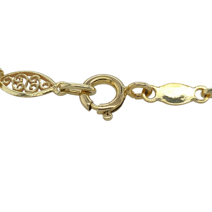 Add elegant detail and timeless style to your jewellery collection with this pre-owned 9ct yellow gold open swirl link bracelet, featuring a distinctive design with versatile everyday appeal—perfect for gifting, layering, or refined daily wear.

Design: The bracelet features a beautiful open swirl link design measuring approximately 5mm wide, creating a graceful and decorative appearance. The flowing links catch the light beautifully, adding texture, movement, and sophistication to this elegant piece.