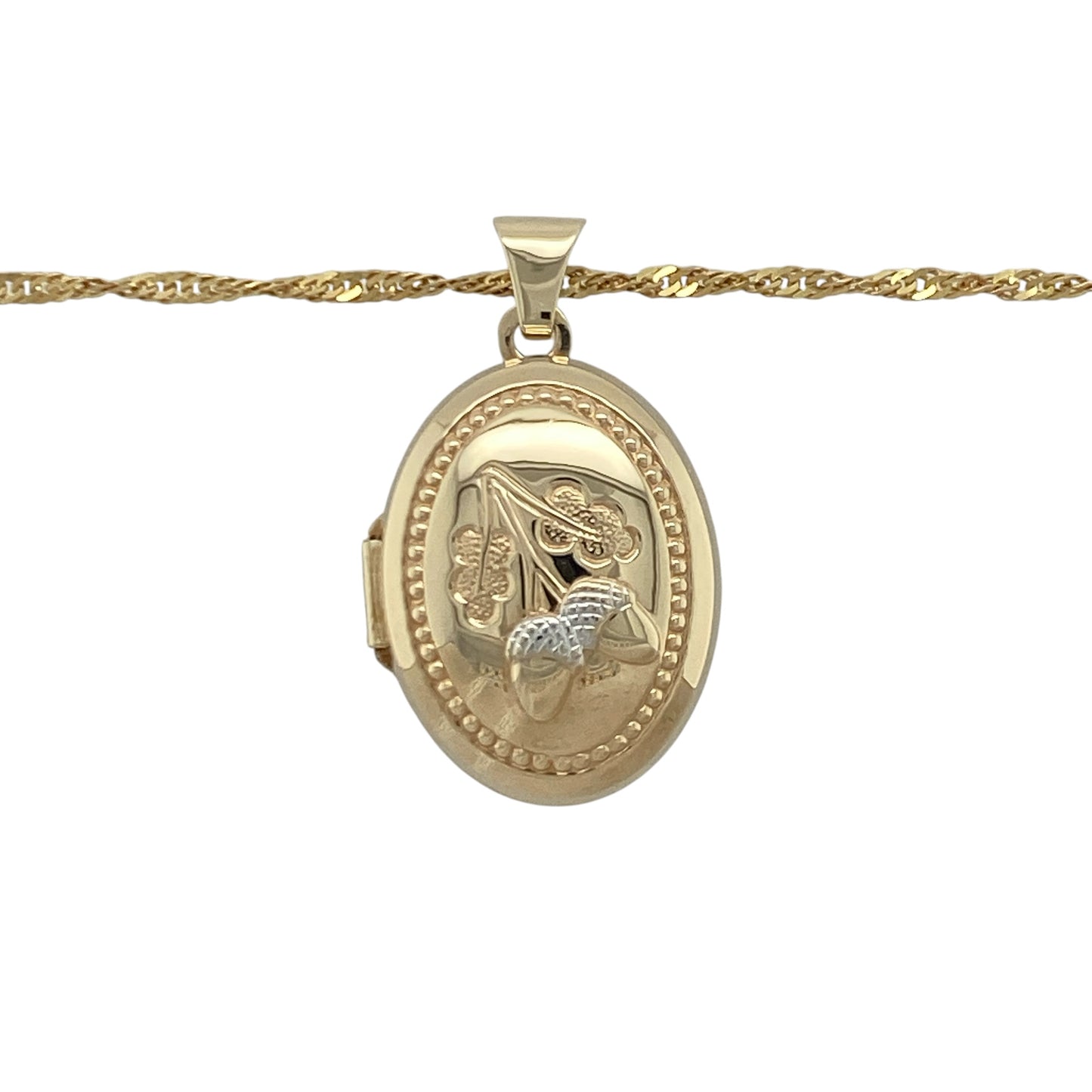 Add a touch of nature-inspired elegance and timeless sentiment to your jewellery collection with this pre-owned 9ct yellow and white gold acorn oval locket necklace, featuring a beautifully detailed design with meaningful everyday appeal—perfect for gifting, keepsakes, or treasured personal wear.

Design: The necklace features an elegant oval locket adorned with an attractive acorn-inspired motif, symbolising growth, strength, and new beginnings.
