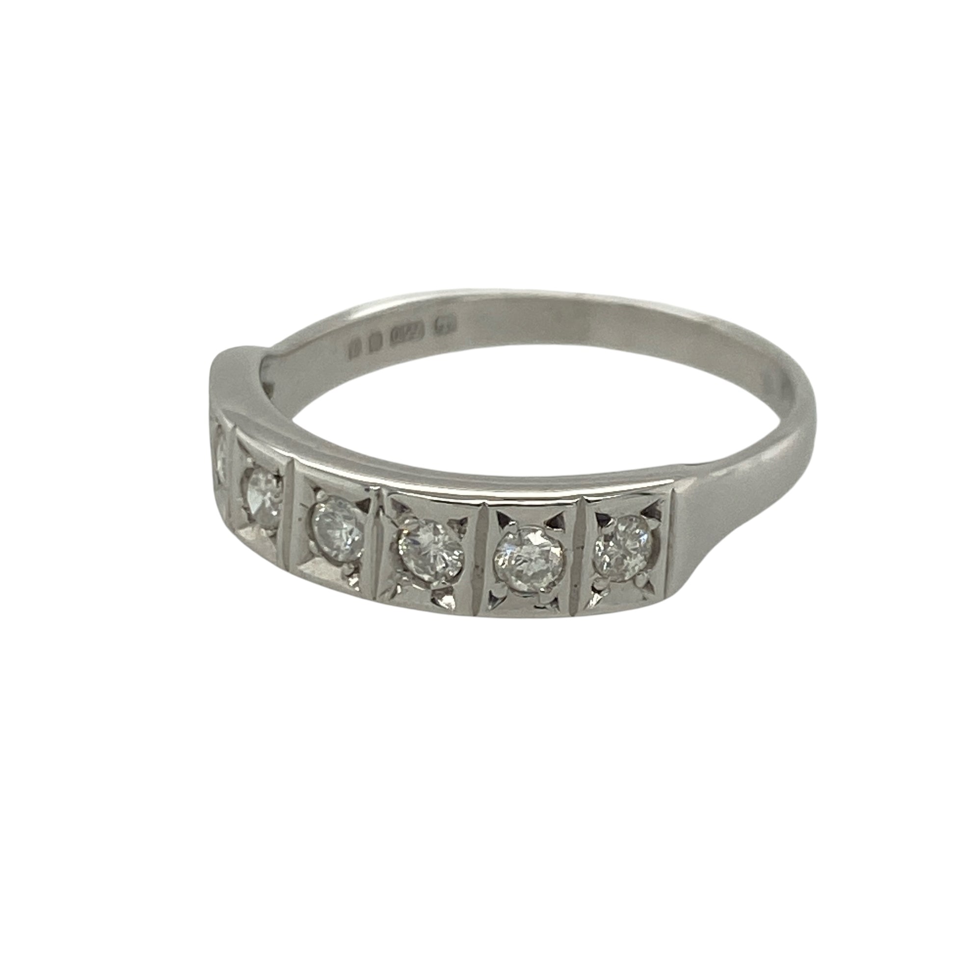 Add timeless sparkle and elegant simplicity to your jewellery collection with this pre-owned 9ct white gold diamond band ring, featuring a classic design with refined everyday appeal—perfect for anniversaries, weddings, stacking, or sophisticated daily wear.

Design: The ring features a beautifully crafted diamond-set band measuring approximately 4mm wide at the front.
