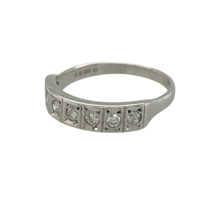 Add timeless sparkle and elegant simplicity to your jewellery collection with this pre-owned 9ct white gold diamond band ring, featuring a classic design with refined everyday appeal—perfect for anniversaries, weddings, stacking, or sophisticated daily wear.

Design: The ring features a beautifully crafted diamond-set band measuring approximately 4mm wide at the front.