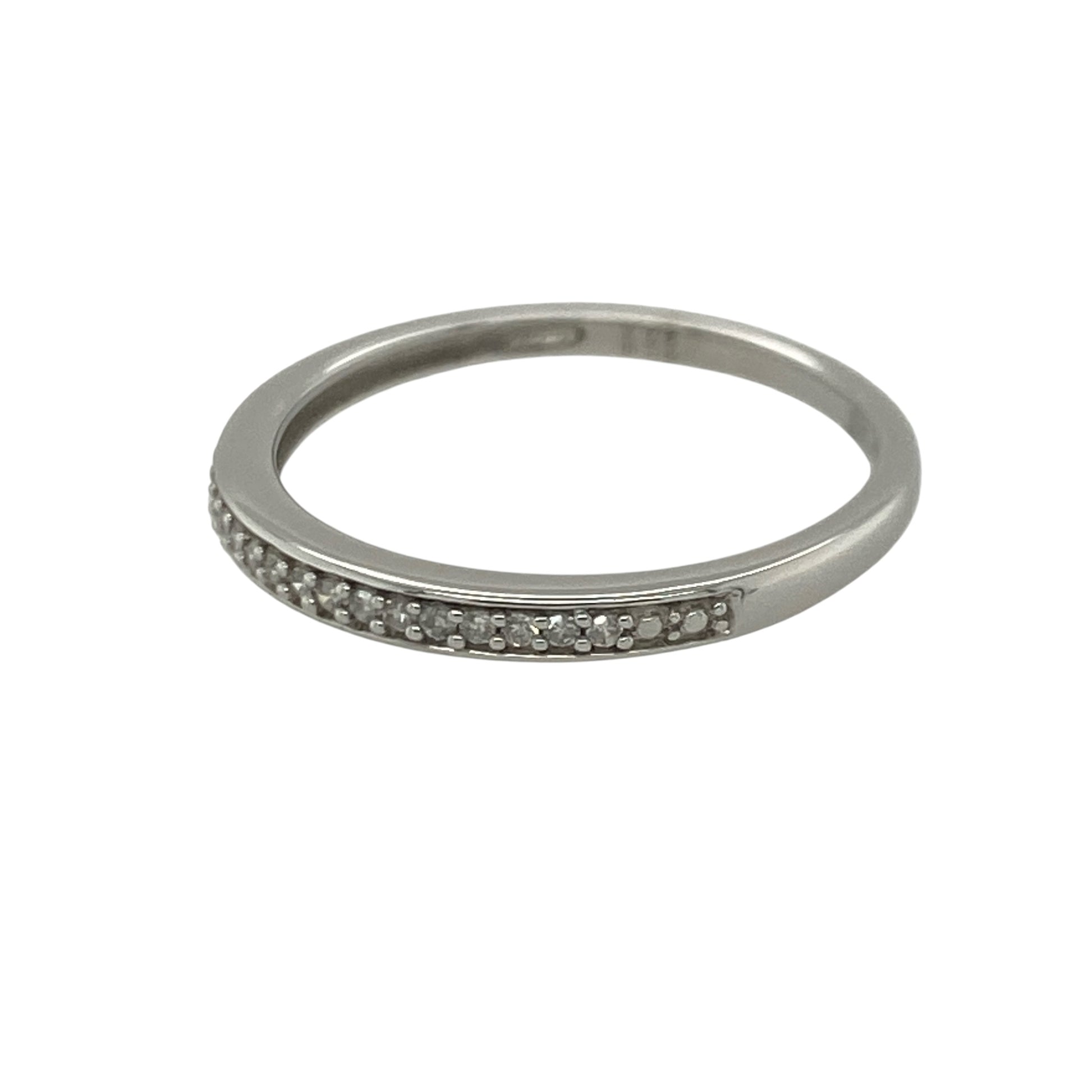 Add subtle sparkle and timeless elegance to your jewellery collection with this pre-owned 18ct white gold diamond band ring, featuring a delicate design with refined everyday appeal—perfect for anniversaries, weddings, stacking, or sophisticated daily wear.

Design: The ring features a slim diamond-set band measuring approximately 2mm wide at the front, creating a delicate and elegant appearance.