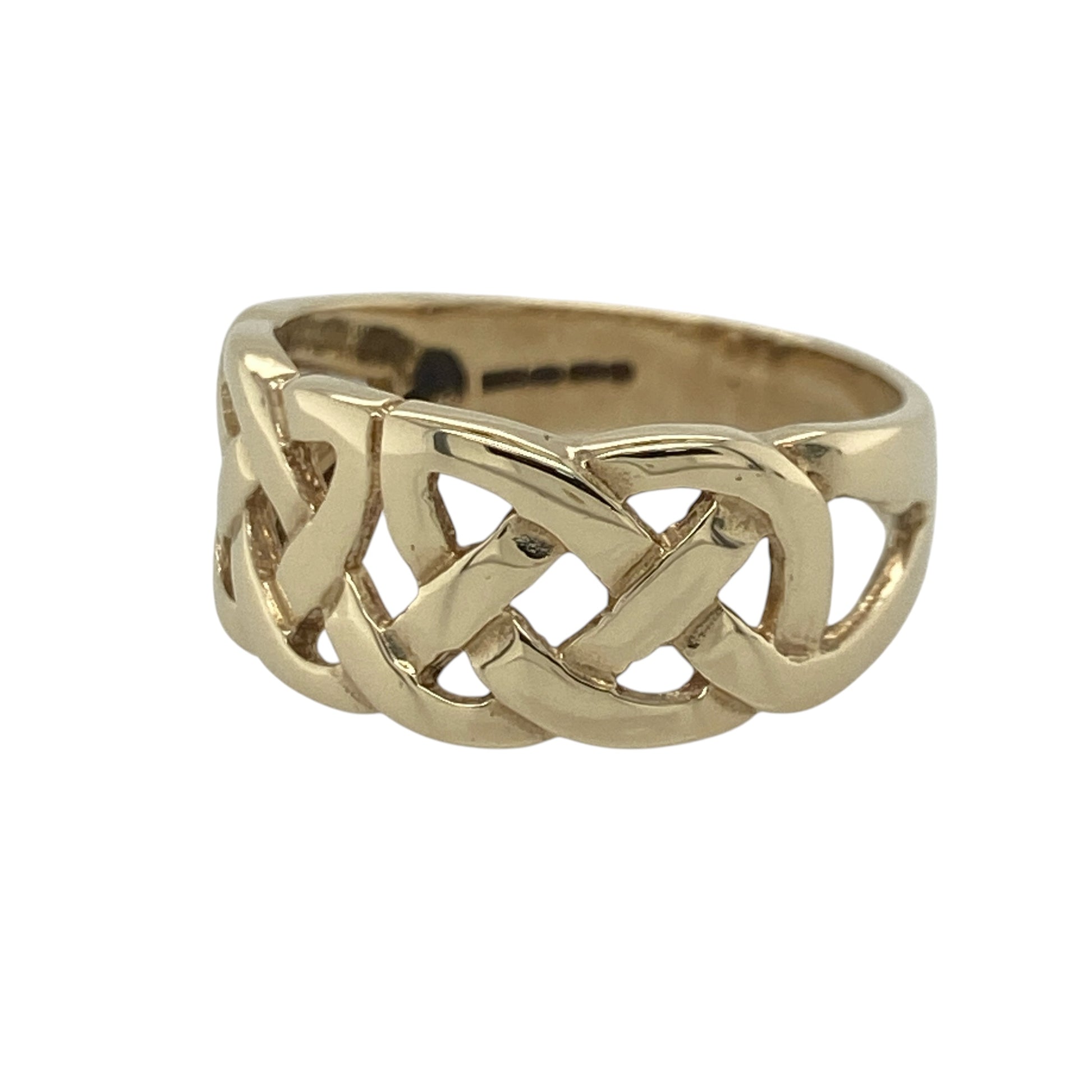 Celebrate timeless heritage and distinctive style with this pre-owned 9ct yellow gold Celtic knot wide band ring, featuring a bold design with meaningful symbolism and enduring appeal—perfect for everyday wear, gifting, or adding a touch of Celtic tradition to your jewellery collection.

Design: The ring showcases an impressive wide band design measuring approximately 9mm across the front, adorned with an intricate Celtic knot pattern.