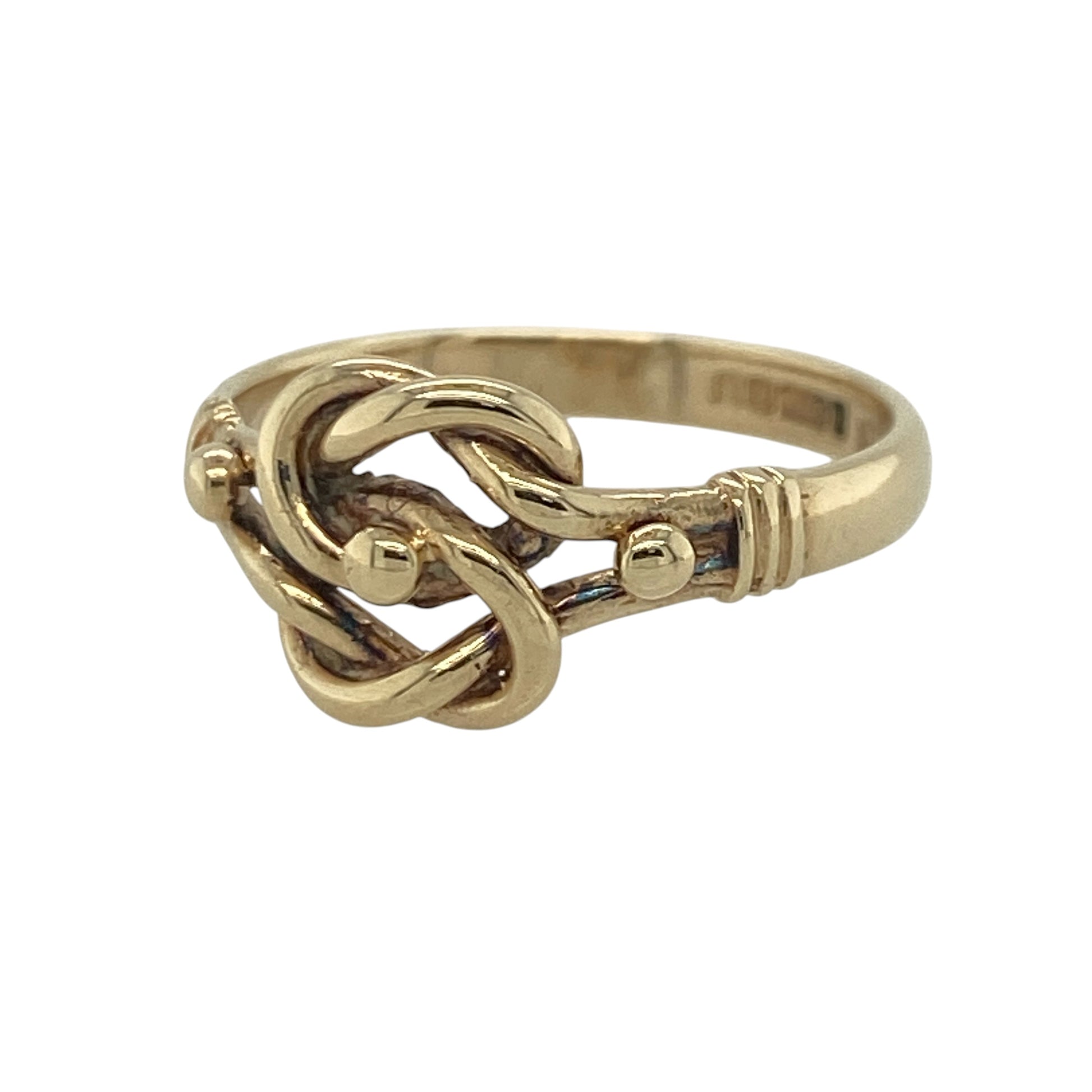 Add timeless elegance and symbolic charm to your jewellery collection with this pre-owned 9ct yellow gold knot ring, featuring a classic design with meaningful everyday appeal—perfect for gifting, special occasions, or refined daily wear.

Design: The ring showcases an attractive knot motif measuring approximately 9mm high at the front, creating an elegant focal point with graceful curves and timeless styling.