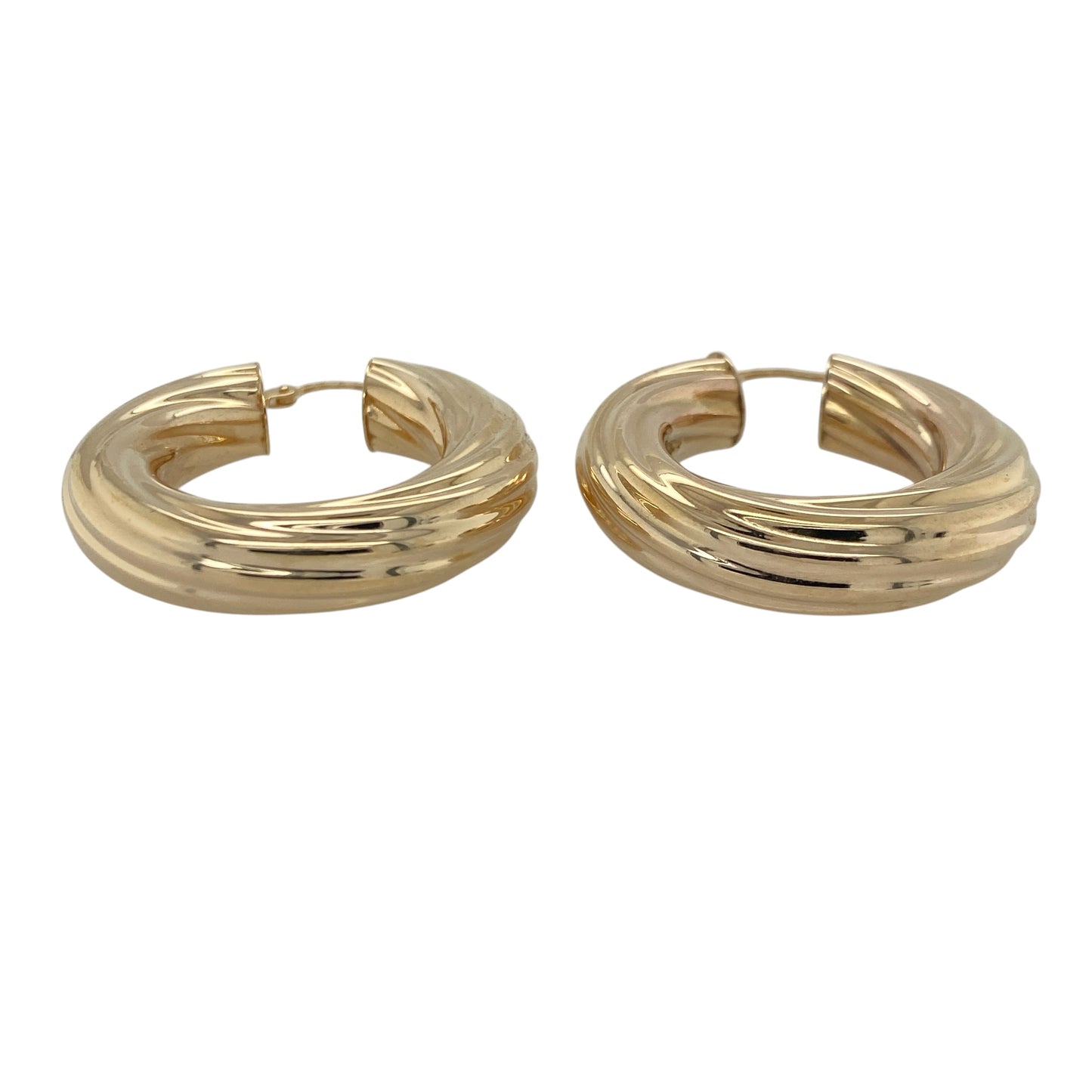 Make a bold statement with these pre-owned 9ct yellow gold large chunky twisted hoop creole earrings, featuring a striking design with timeless appeal and impressive presence—perfect for special occasions, everyday glamour, or elevating any jewellery collection.

Design: The earrings feature a large hoop creole silhouette enhanced with an attractive twisted design, creating beautiful texture and light-catching detail throughout.