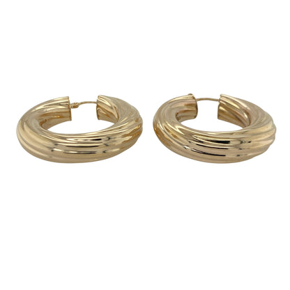 Make a bold statement with these pre-owned 9ct yellow gold large chunky twisted hoop creole earrings, featuring a striking design with timeless appeal and impressive presence—perfect for special occasions, everyday glamour, or elevating any jewellery collection.

Design: The earrings feature a large hoop creole silhouette enhanced with an attractive twisted design, creating beautiful texture and light-catching detail throughout.