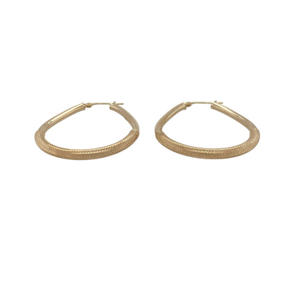 Add timeless style and versatile elegance to your jewellery collection with these pre-owned 9ct yellow gold half plain, half textured oval creole earrings, featuring a distinctive design with everyday appeal—perfect for gifting, daily wear, or complementing any jewellery collection.

Design: The earrings feature a classic oval creole shape with an attractive combination of smooth polished and textured finishes.