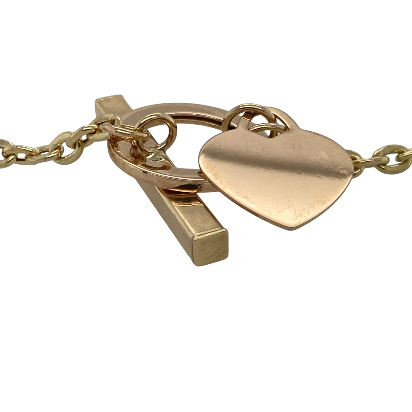 Add a touch of romantic charm and timeless style to your jewellery collection with this pre-owned 9ct yellow and rose gold belcher bracelet, featuring a beautiful heart tag and T-bar fastening with elegant everyday appeal—perfect for gifting, layering, or treasured daily wear.

Design: The bracelet features classic belcher links measuring approximately 3mm wide, complemented by an attractive heart-shaped tag and traditional T-bar fastening.