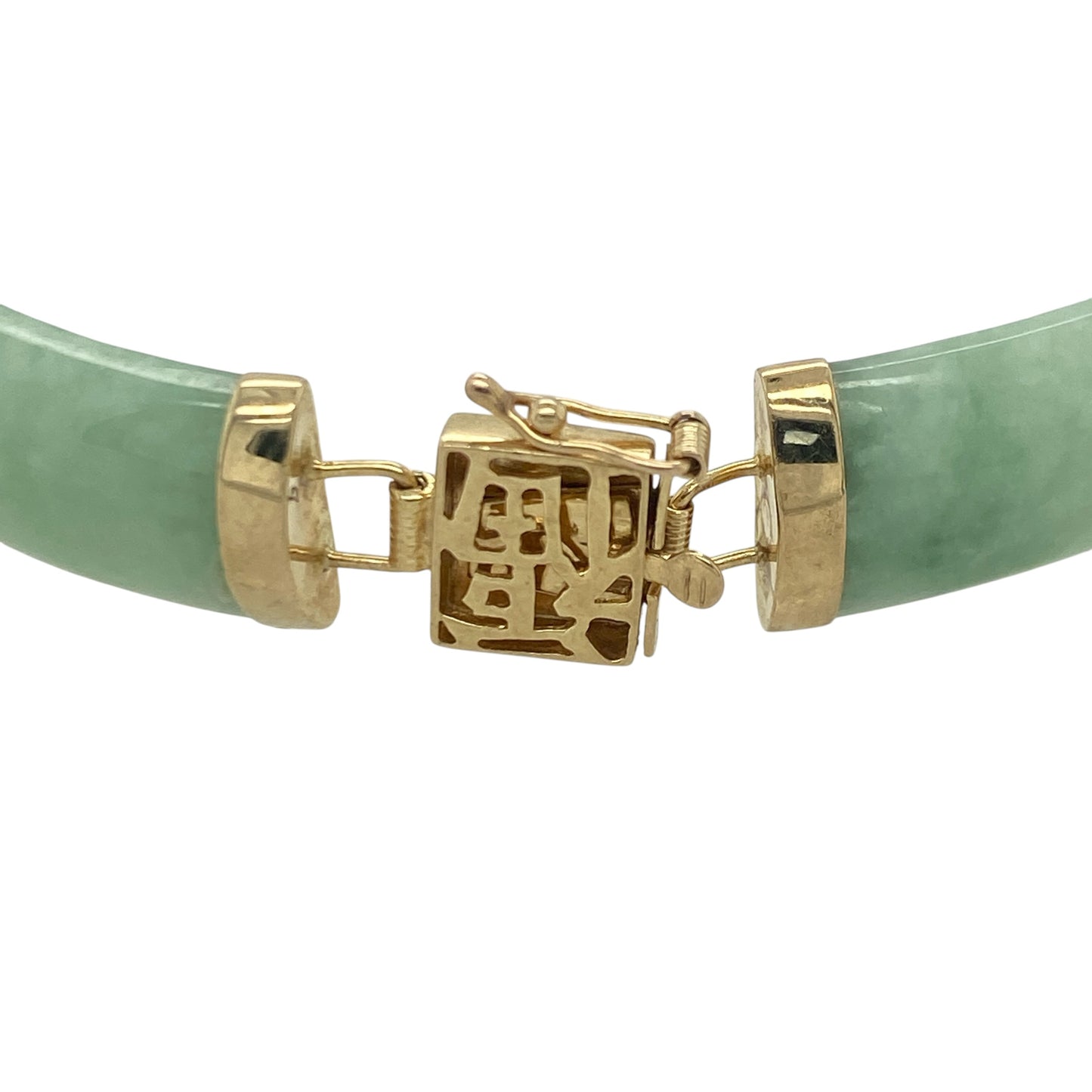 Add a touch of elegance and cultural inspiration to your jewellery collection with this pre-owned 9ct yellow gold and jade oriental style bracelet, featuring a striking design with timeless appeal—perfect for special occasions, gifting, or treasured everyday wear.

Design: The bracelet showcases a series of beautifully polished curved jade bars, each measuring approximately 15mm by 9mm, linked together to create a graceful and distinctive oriental-inspired design.