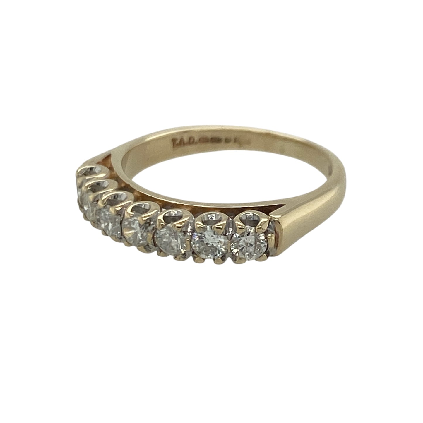 diamond seven stone band ring, featuring a beautifully balanced design with refined everyday appeal—perfect for anniversaries, special occasions, or sophisticated daily wear.

Design: The ring showcases seven brilliant cut diamonds arranged across the band, creating a continuous display of sparkle and elegance. With approximately 0.50ct of total diamond content, the diamonds offer impressive brilliance and make this ring a striking yet timeless piece.