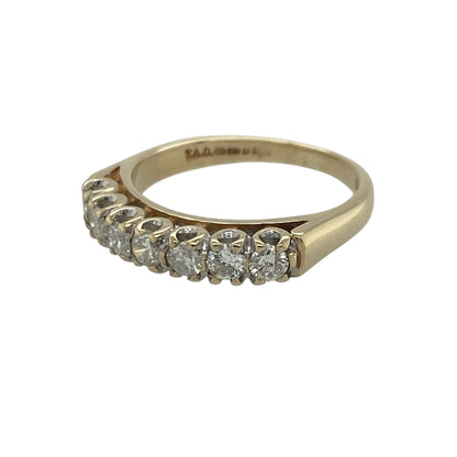 diamond seven stone band ring, featuring a beautifully balanced design with refined everyday appeal—perfect for anniversaries, special occasions, or sophisticated daily wear.

Design: The ring showcases seven brilliant cut diamonds arranged across the band, creating a continuous display of sparkle and elegance. With approximately 0.50ct of total diamond content, the diamonds offer impressive brilliance and make this ring a striking yet timeless piece.