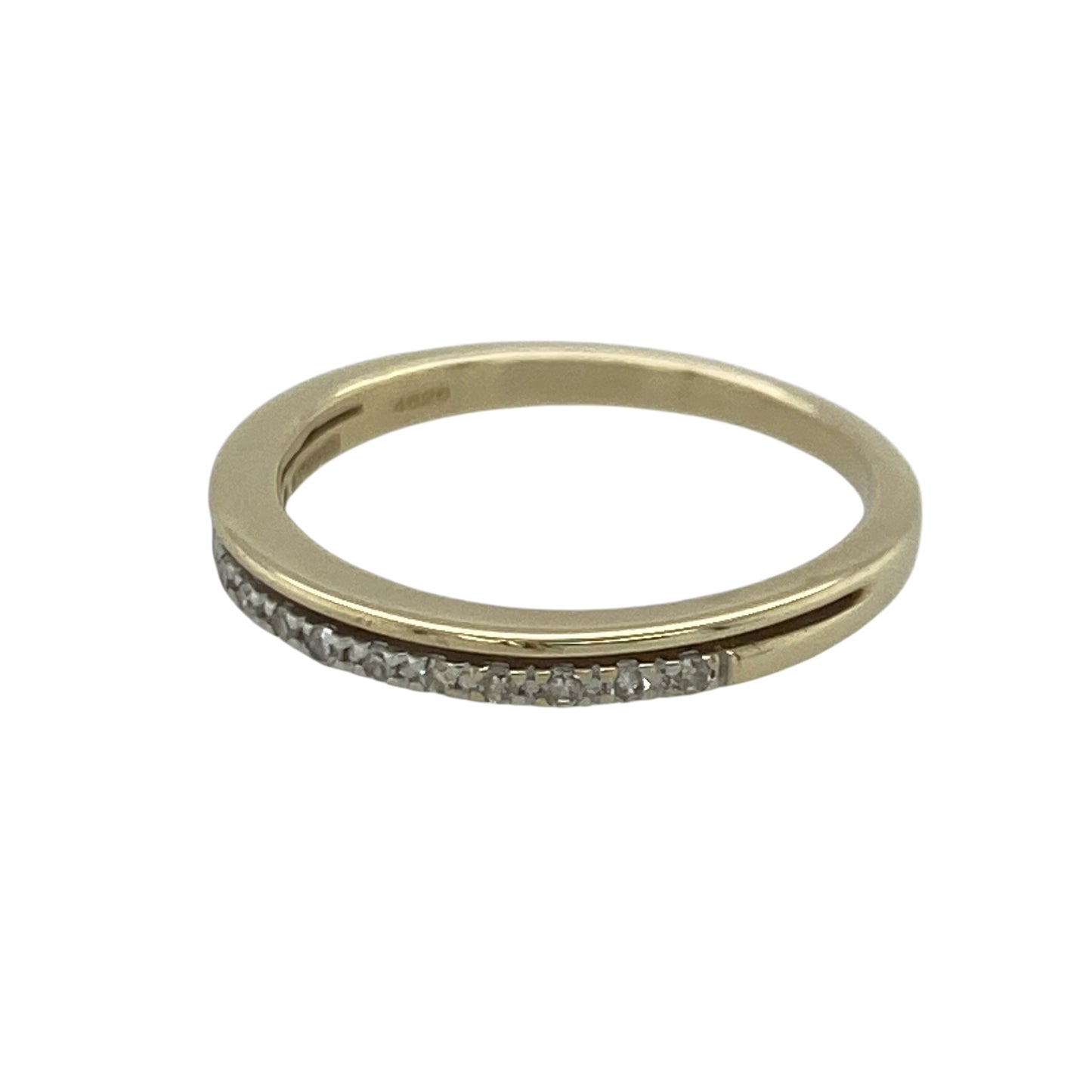 Add understated sparkle and timeless elegance to your jewellery collection with this pre-owned 9ct yellow gold diamond band ring, featuring a delicate design with refined everyday appeal—perfect for anniversaries, stacking, special occasions, or daily wear.

Design: The ring features a slim diamond-set band measuring approximately 2mm wide at the front, creating a graceful and elegant appearance. The delicate profile offers a subtle touch of sparkle while maintaining a classic and versatile style.