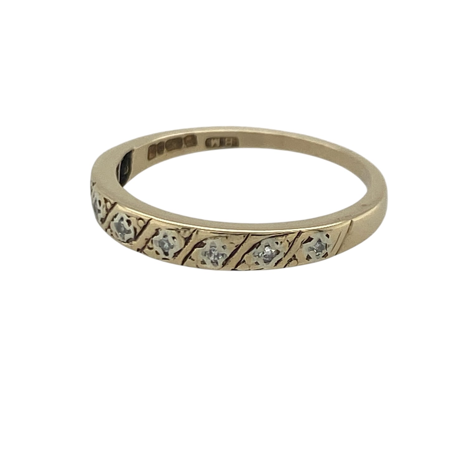 Add timeless sparkle and elegant styling to your jewellery collection with this pre-owned 9ct yellow gold diamond twist band ring, featuring a graceful design with refined everyday appeal—perfect for anniversaries, special occasions, stacking, or daily wear.

Design: The ring showcases an attractive twist-style band measuring approximately 3mm wide at the front.