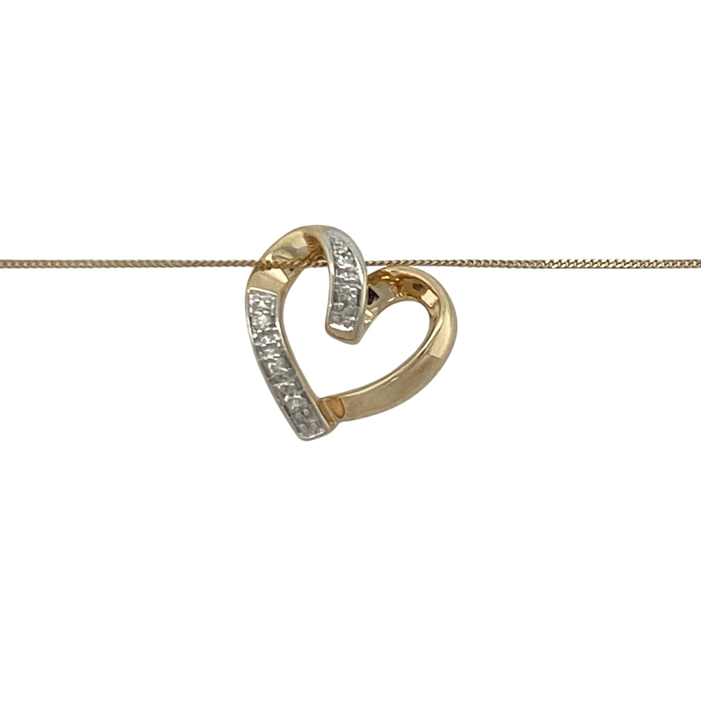 Add a touch of romance and timeless sparkle to your jewellery collection with this pre-owned 9ct yellow gold diamond open heart pendant necklace, featuring an elegant design with meaningful everyday appeal—perfect for gifting, special occasions, or treasured daily wear.

Design: The necklace features a delicate open heart pendant measuring approximately 13mm by 13mm, beautifully accented with sparkling diamonds that add a subtle touch of brilliance.
